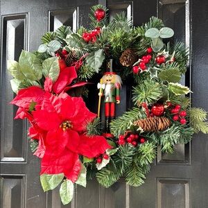 Festive Holiday Wreath with Nutcracker and Red Accents